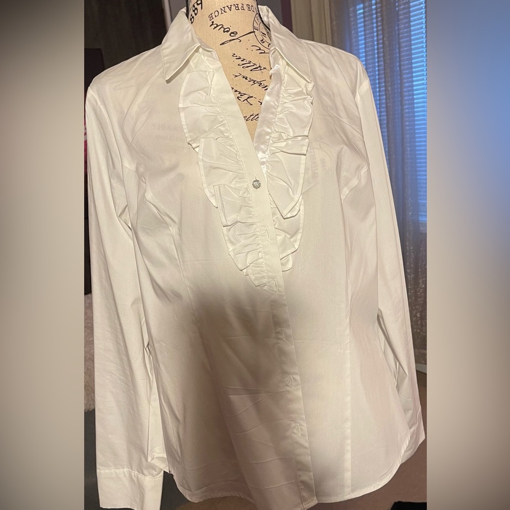 White ruffle blouse, size L.